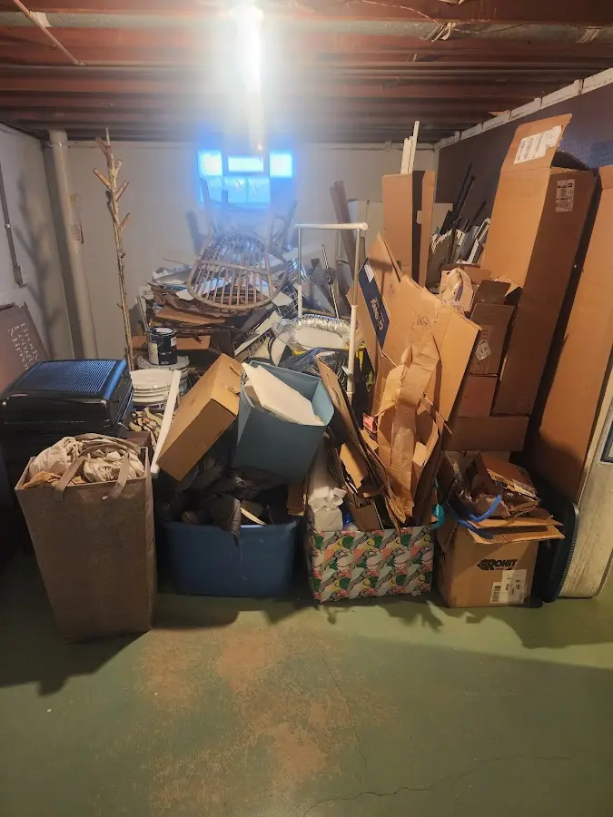 Roll-off dumpster container at job site for 2 Yard Dumpster Rental in Elmendorf